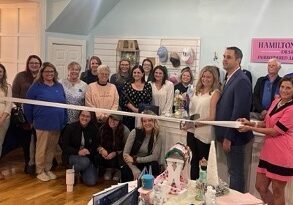 Amanda Adams cuts the ribbon celebrating Hamilton Brooks Design membership into the Winchester-Clark County Chamber of Commerce.