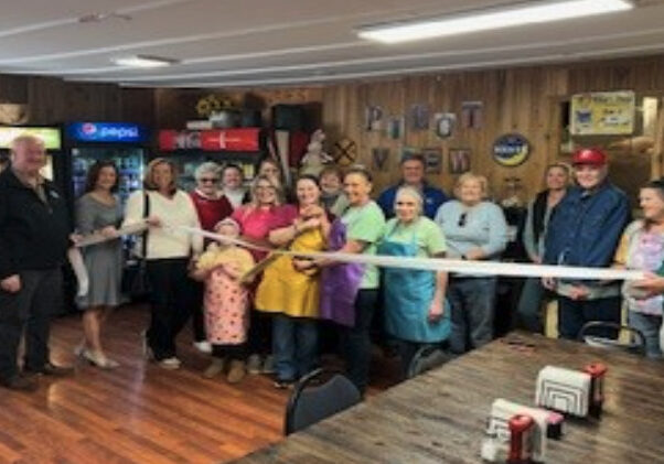 Tricia Lawson &amp; Tanna Howard cut the ribbon celebrating Pilot View Market and Bakery, LLC membership into the Winchester- Clark County Chamber of Commerce. Pilot View Market and Bakery, LLC located 7695 Ironworks