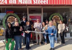 Jack and Jessica Jarrell cut the ribbon celebrating The Past Time’s membership into the Winchester-Clark County Chamber of Commerce.