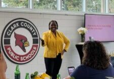 Coach Colene speaks at the Clark County Community Center