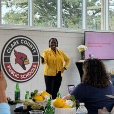 Coach Colene speaks at the Clark County Community Center